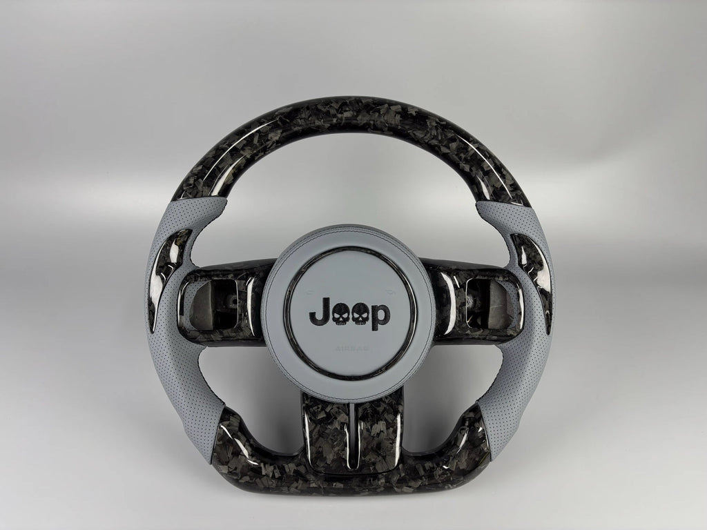 Forged carbon steering wheel with gray grips by MAB Customs